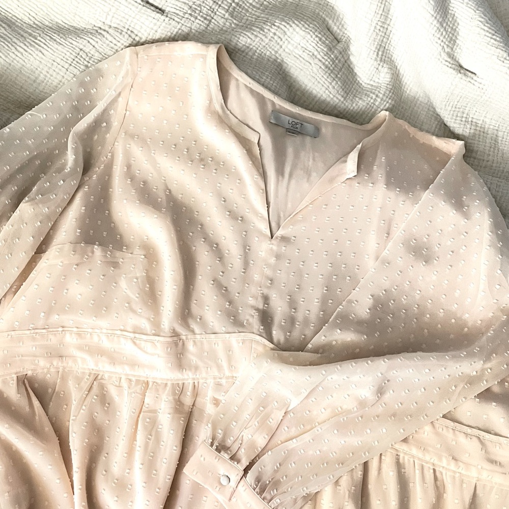 Soft pink flowy long-sleeved top with Swiss dots